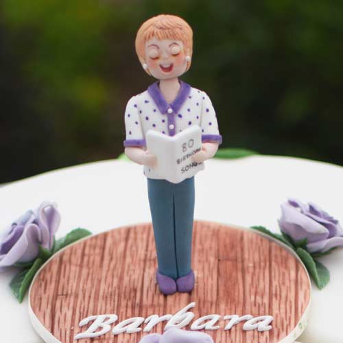 Choir singing novelty birthday cake by Ann White in Suffolk